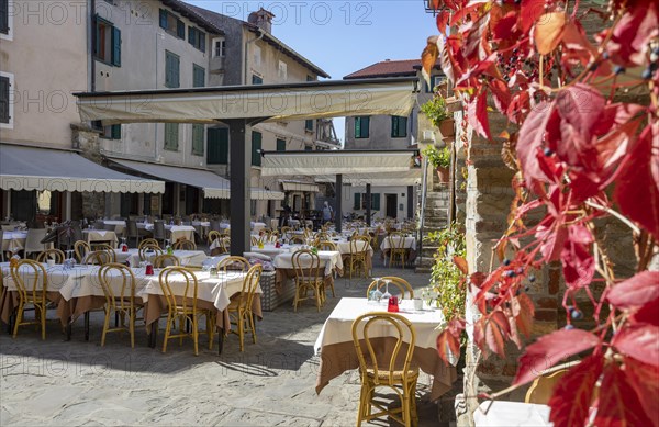 Tables laid out in a restaurant in the old town