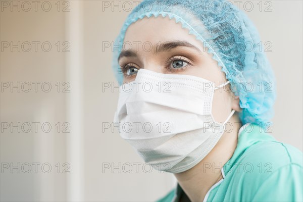 Low angle nurse with mask hospital