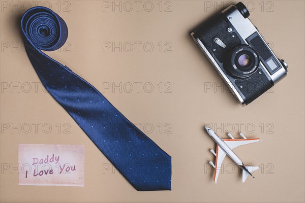 Background with necktie plane camera father s day