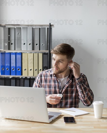 Man office with laptop