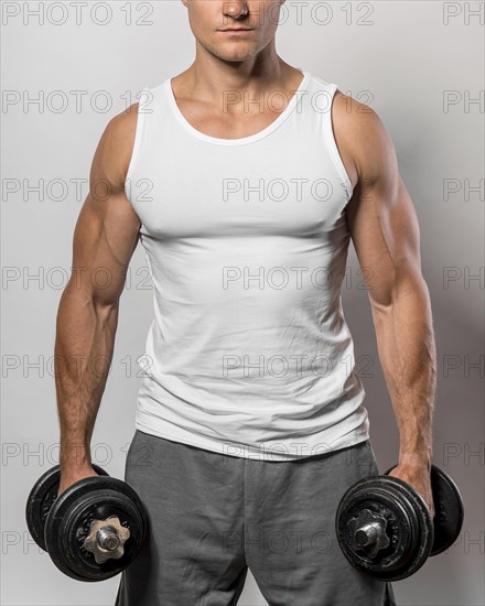 Front view fit man with tank top weights