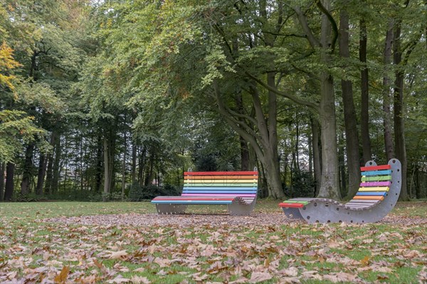 Colourful bench and colourful lounger
