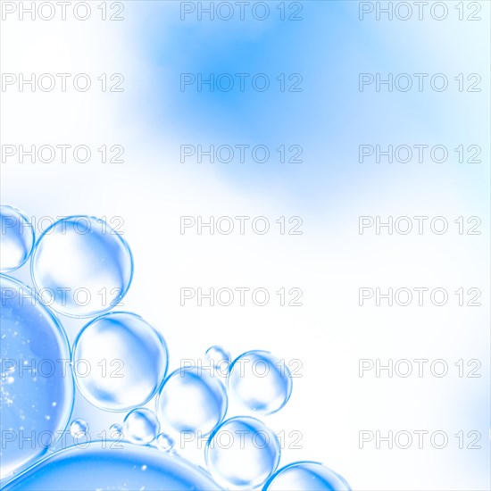 Abstract air bubbles water bright cyan blurred background