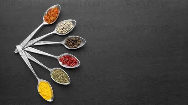 Copy space spoons with powder condiments