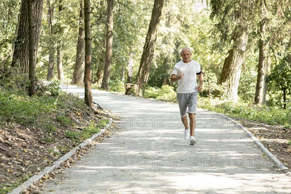 Full shot elder man running