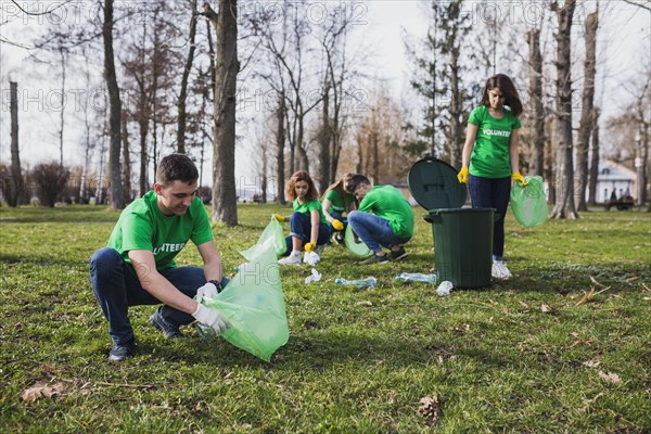 Group volunteers collecting garbage