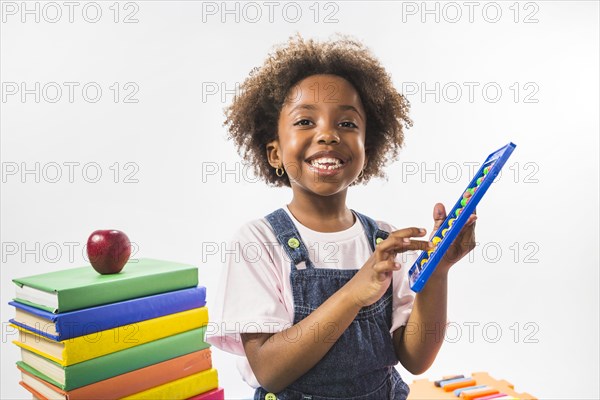Child with abacus studio