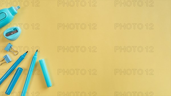 Desk school supplies light background