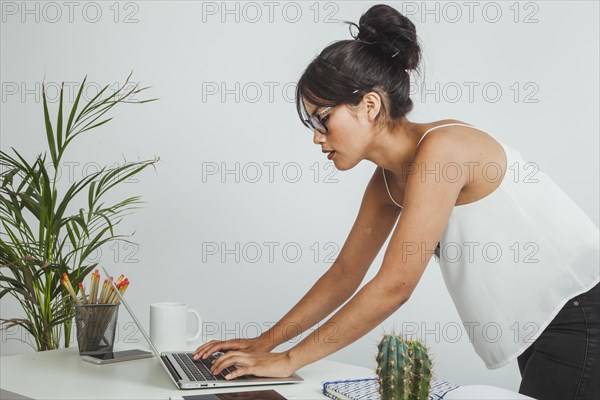 Businesswoman working with bad posture