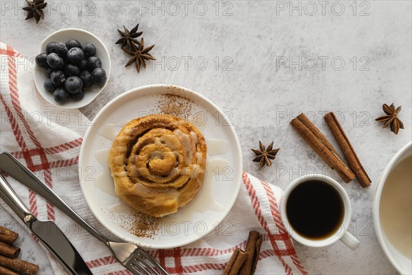 Top view cinnamon roll blueberries