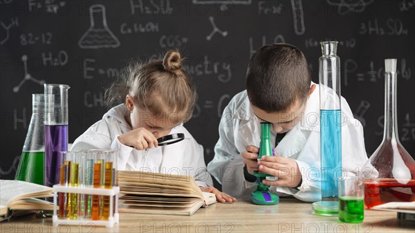 Children doing experiments laboratory