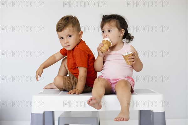 Front view siblings with ice cream