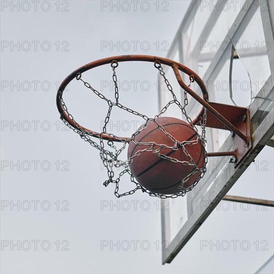 Side view basket with ball it