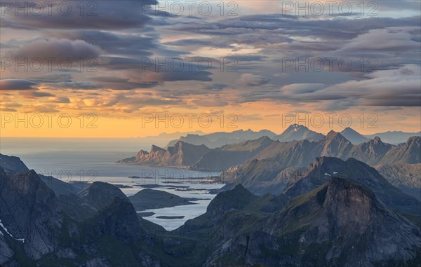 View over mountain tops and sea to Fredvang