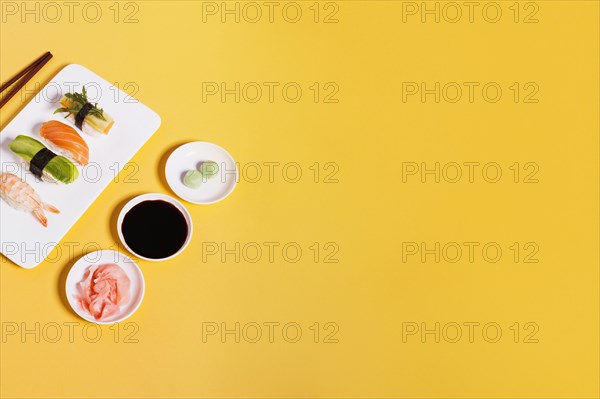 Assorted sushi condiments yellow