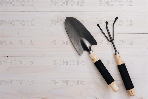 Flat lay gardening tools with copy space