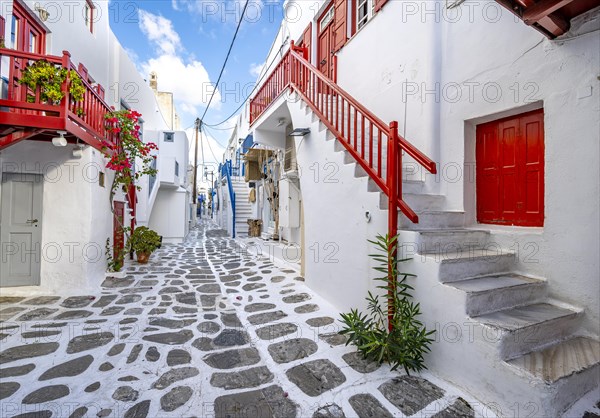 Cycladic white houses with colourful doors and shutters