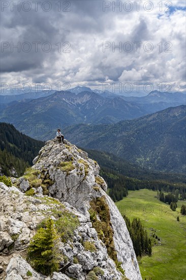 Mountaineer at the summit of Taubenstein