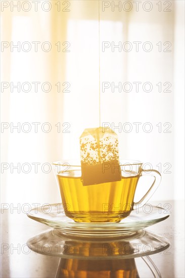 Tea bag inside cup