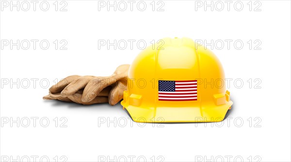 Yellow hardhat with an american flag decal on the front and gloves isolated on white background