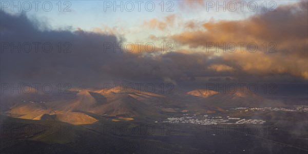 Panorama at sunrise from the Montana de Guardilama to the wine-growing area La Geria