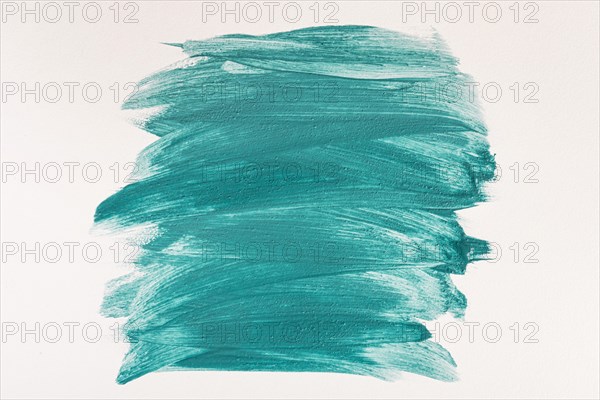 Flat lay blue paint brush strokes surface