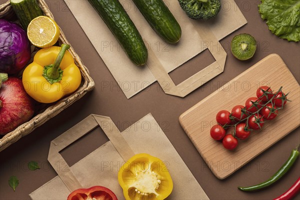 Flat lay basket organic vegetables with grocery bag