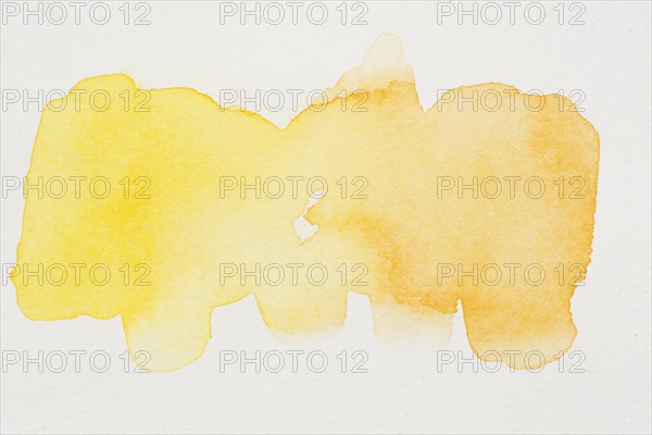Smears bright yellow watercolor