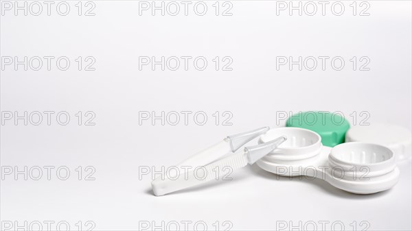 Contact lenses case with copy space tweezers