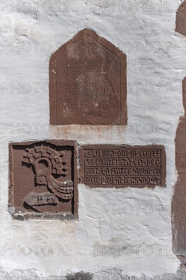 Grave plaques and coats of arms at the former abbey of the Cistercian monks