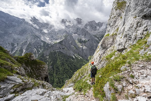 Climbers in steep terrain on the way to Waxenstein