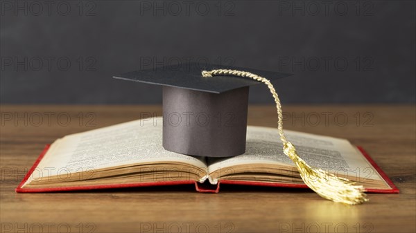 Education day composition with graduation cap