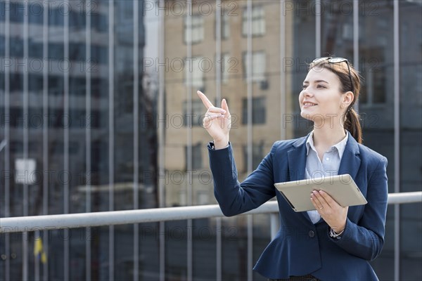 Brunette businesswoman outdoors