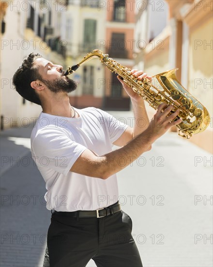 Passionated musician performing street