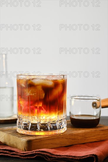 Glass with shiny espresso tonic