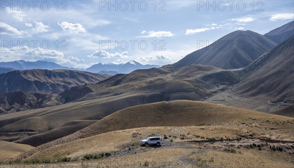 Toyota Land Cruiser four-wheel drive vehicle on a dirt road