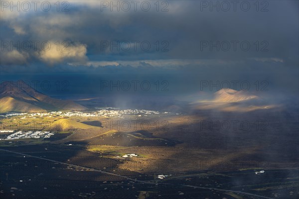 Panorama at sunrise from the Montana de Guardilama to the wine-growing area La Geria