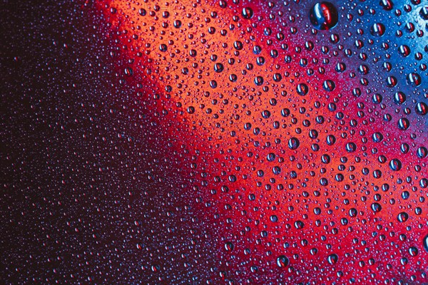 Macro abstract drops water bright surface