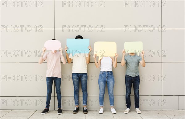 Group friends holding speech bubbles