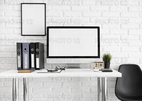 Desk with computer screen chair