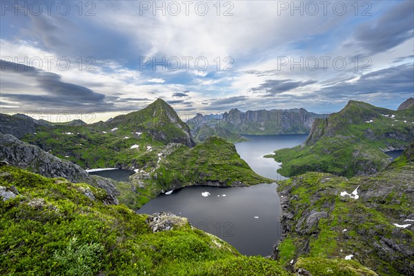 View over mountain landscape and lake Litlforsvatnet with fjord Forsfjorden