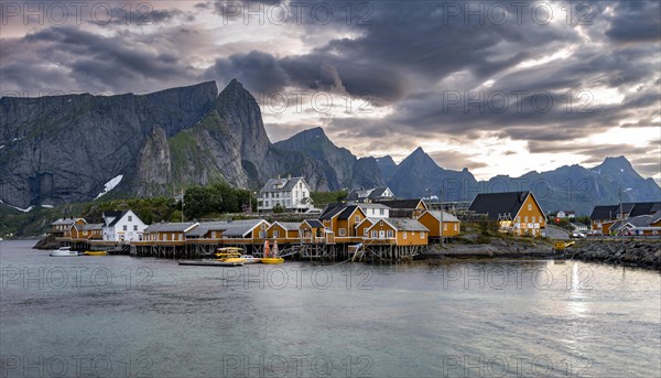 Traditional yellow rorbuer cabins on Sakrisoya Island