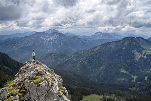 Mountaineer at the summit of Taubenstein