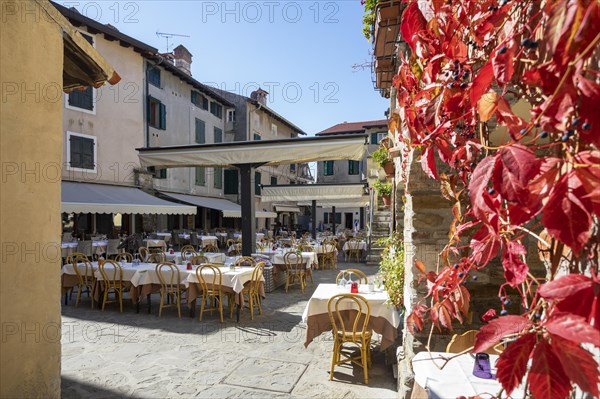 Tables laid out in a restaurant in the old town