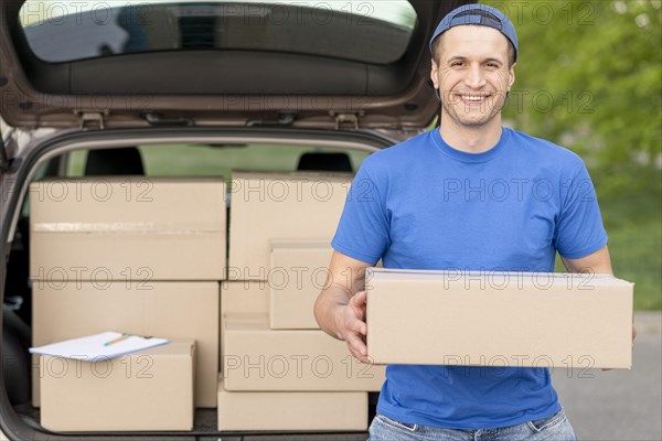 Smiley guy delivering box