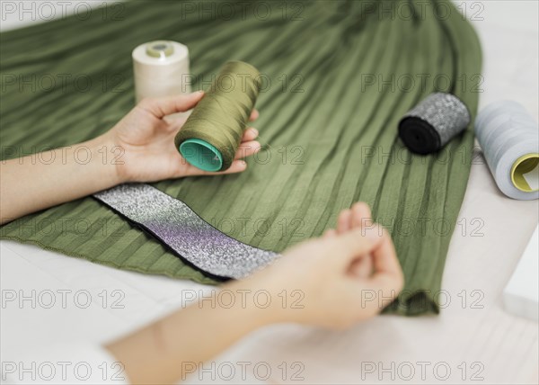 Woman sewing manual skirt