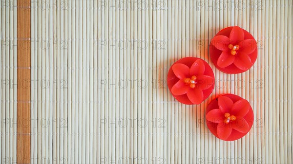 Red flower shaped candles