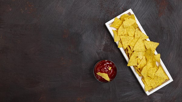 Nachos rectangular white plate ketchup small bowl