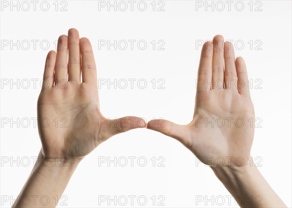 Front view hands showing palms