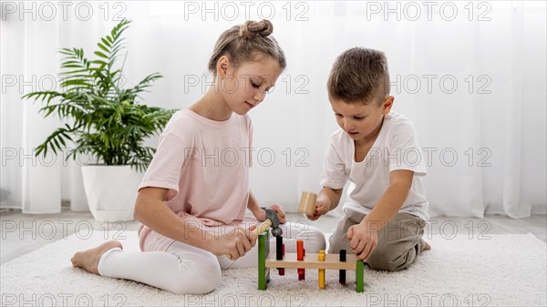 Kids playing with colorful game together